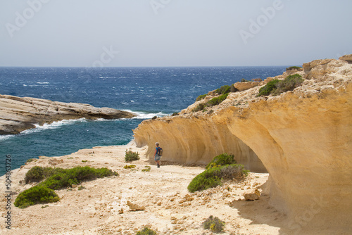 Фотография Uplifted wavecut notch on Crete, Greece, shows that the land has been lifted up