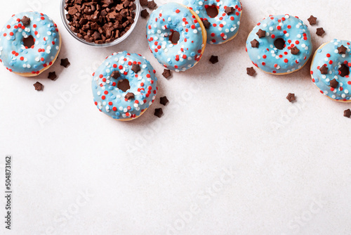 Fresh doughnuts in blue, red and white colors for 4th of July, Independence day in USA