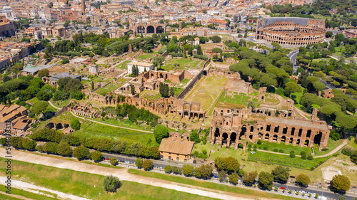 Aerial view of Colosseum and Palatine Hill in Rome, Italy. According to the legend, it is from this hill that the history of Rome began.
