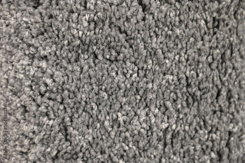 Gray shag carpet. Long pile carpet texture.