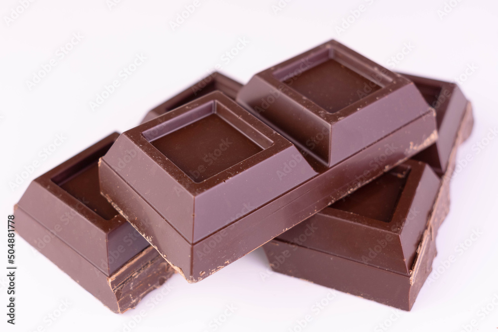 Dark chocolate isolated on white background.Close up.