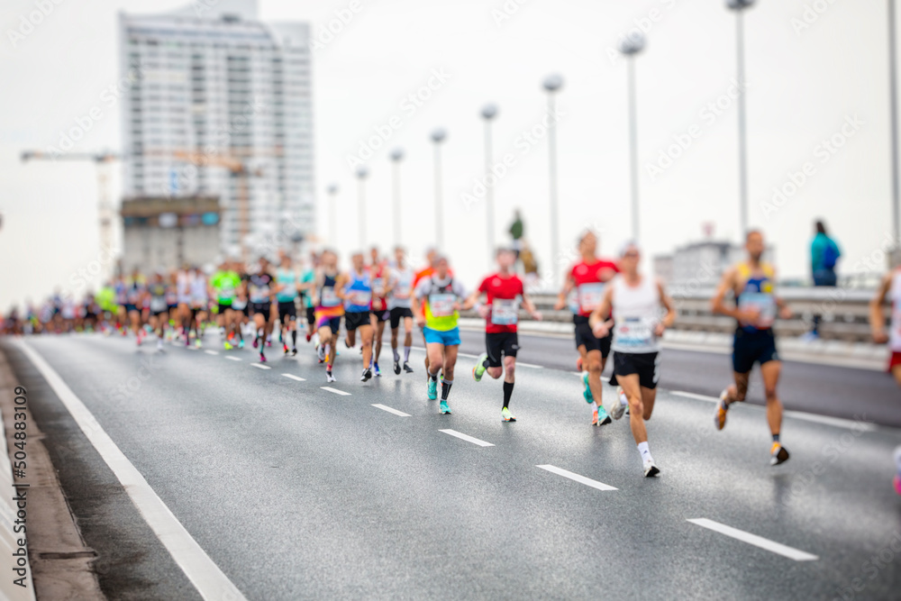 marathon runners in the city