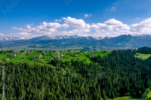 Obraz na płótnie Polskie Podhale wiosną i góry wysokie Tatry, panorama z lotu ptaka. w salonie