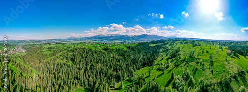 Obraz na płótnie Polskie Podhale wiosną i góry wysokie Tatry, panorama z lotu ptaka. w salonie