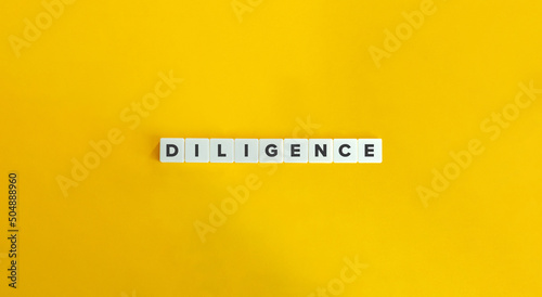 Diligence Word. Concept of Putting in consistent and Earnest Effort towards Tasks. Text on Block Letter Tiles on Yellow Background. Minimal Aesthetics.