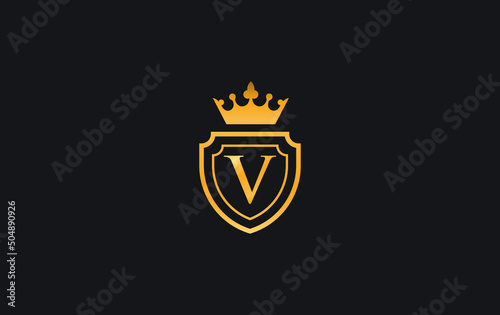Golden Crown and shield logo and symbol design vector with the letter V