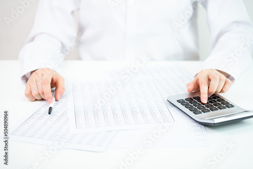 A person who is looking at financial statements in a company