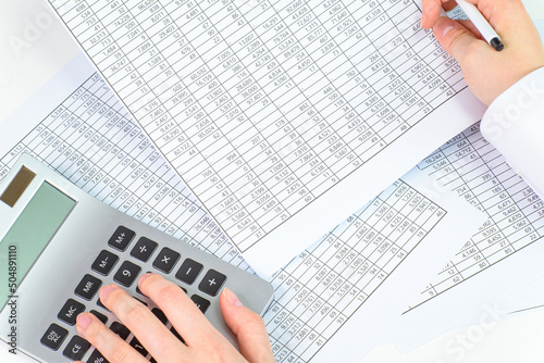 A person who is looking at financial statements in a company