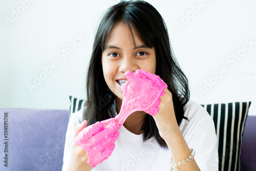 Homemade Toy Called Slime, Kids having fun and being creative by science experiment