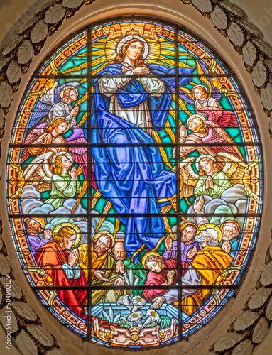 VALENCIA, SPAIN - FEBRUAR 14, 2022: The Assumption in stained glass of the Ca...