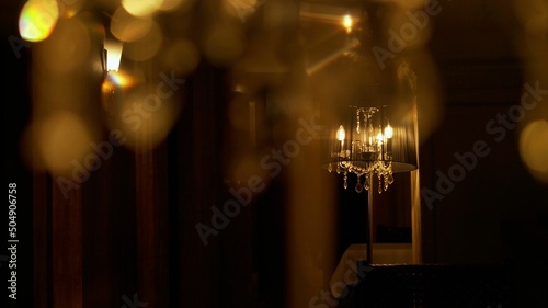 Elegant vintage lamp at night with copy space. Mood Lamp. Lamp in the interior at night. photo