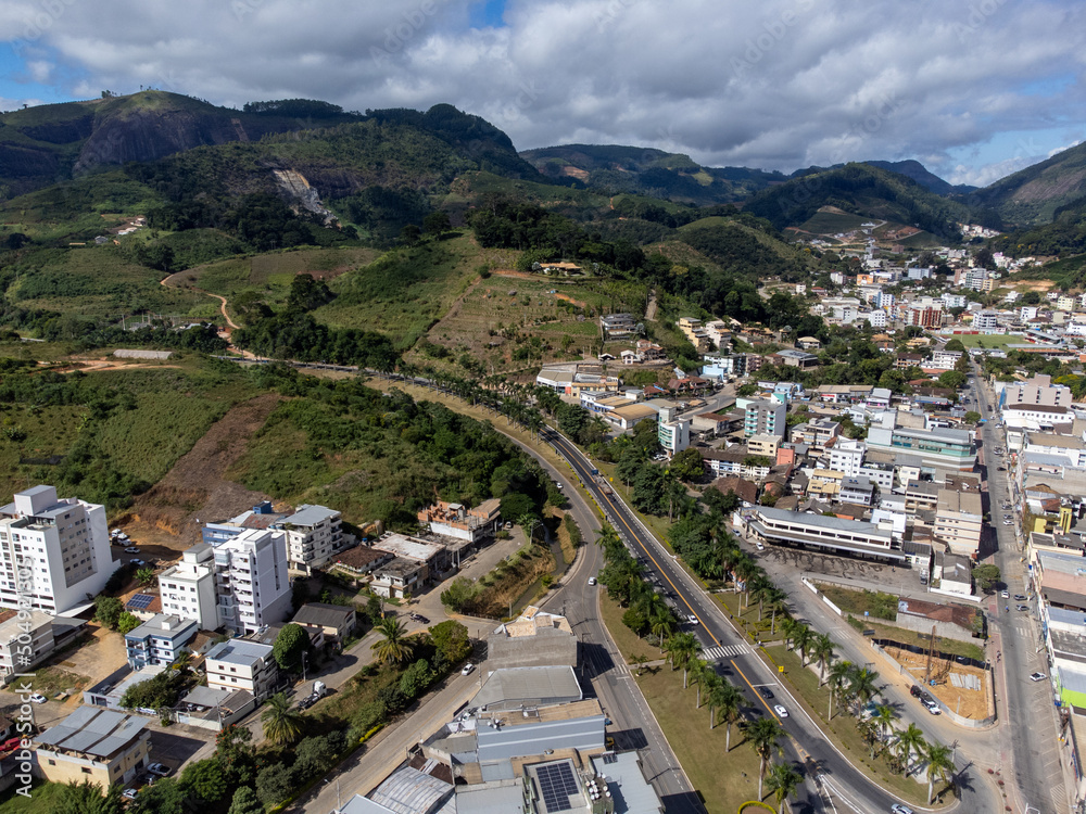 Beautiful highway in a small and organized country town with lots of vegetation, aerial drone view, Venda Nova do Imigrante, Espirito Santo, Brazil