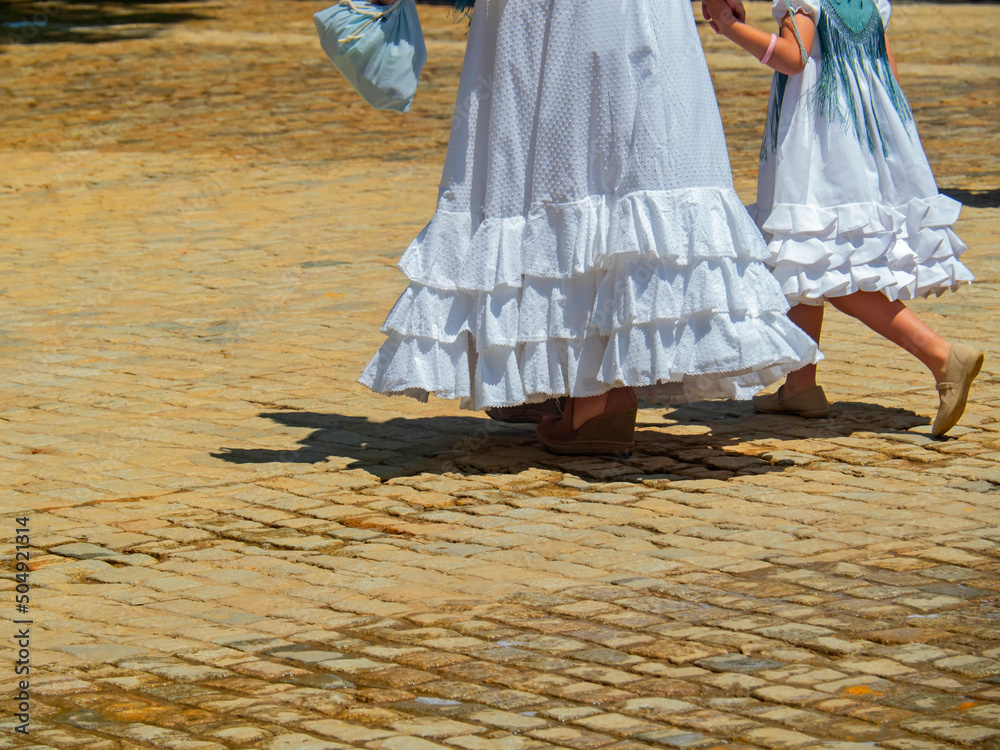 hija con traje de flamenca blanco en la feria / Mother and with flamenco dress at the fair Stock Photo | Adobe Stock