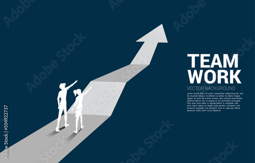 Silhouette of businessman and businesswoman point ahead on step up graph. Concept of people ready to start career and business