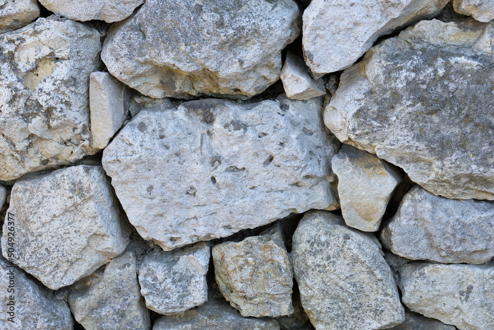 Background of limestone wall with rocky structure Background of limestone wall with rocky structure