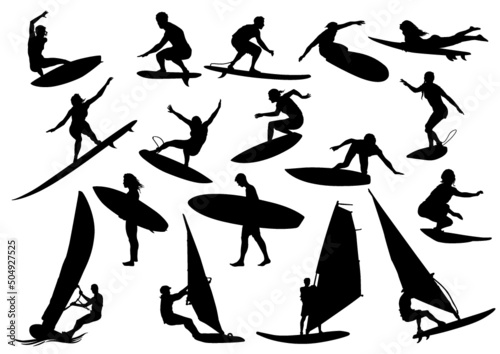 silhouettes of people surfing