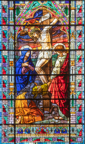 VALENCIA, SPAIN - FEBRUAR 17, 2022: The Crucifixion in neo-gothic stained gla...