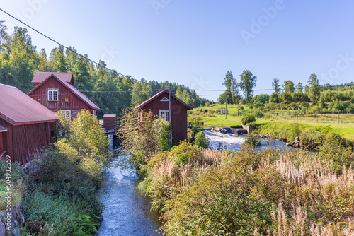 Fototapeta Naklejka Na Ścianę i Meble -  Water canal by an old watermill
