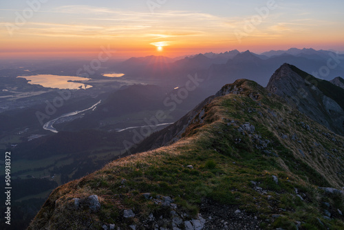 Top of mountain Große Schlicke at sunrise with valley view of Schwangau and Füssen. Tannheimer Valley, Tyrol, Austria