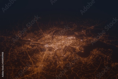 Aerial shot of Kaunas (Lithuania) at night, view from south. Imitation of satellite view on modern city with street lights and glow effect. 3d render
