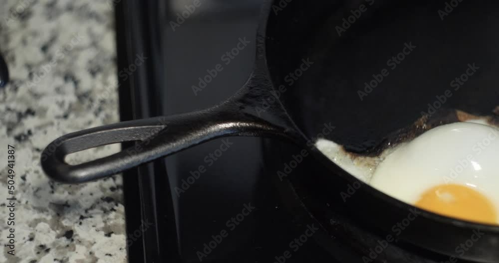 Slide on Fried Eggs in a Cast Iron Pan 4K Slide on Fried Eggs in a Cast Iron Pan 4K