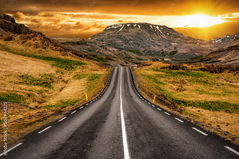Asphalt road in the mountains in Iceland