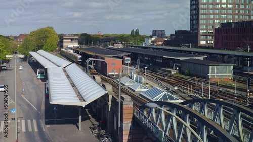 Trains and busses entering and leaving Barmbek station in Hamburg, as seen from above