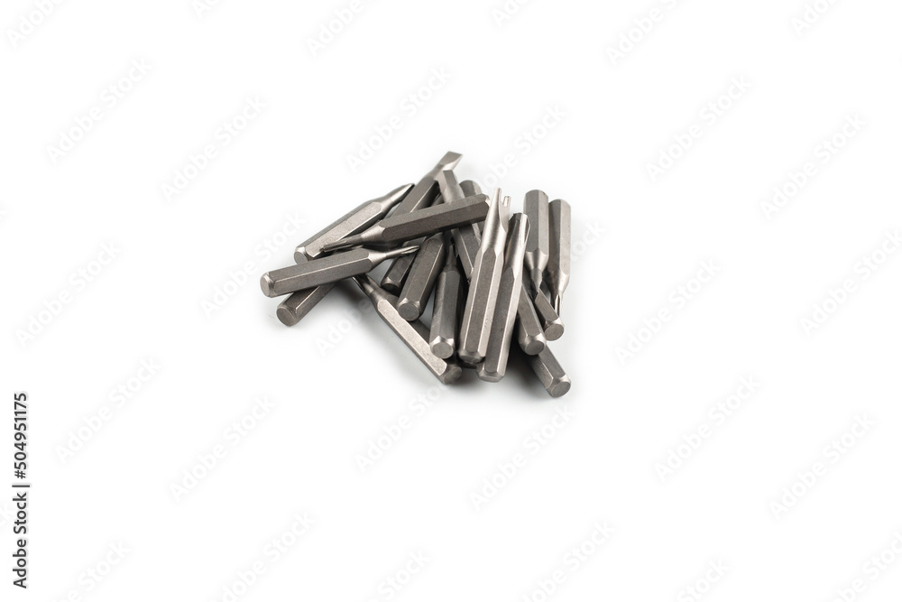Isolated on a white background tips of a group of phillips head screwdriver bits. Top view. Isolated on a white background tips of a group of phillips head screwdriver bits. Top view.