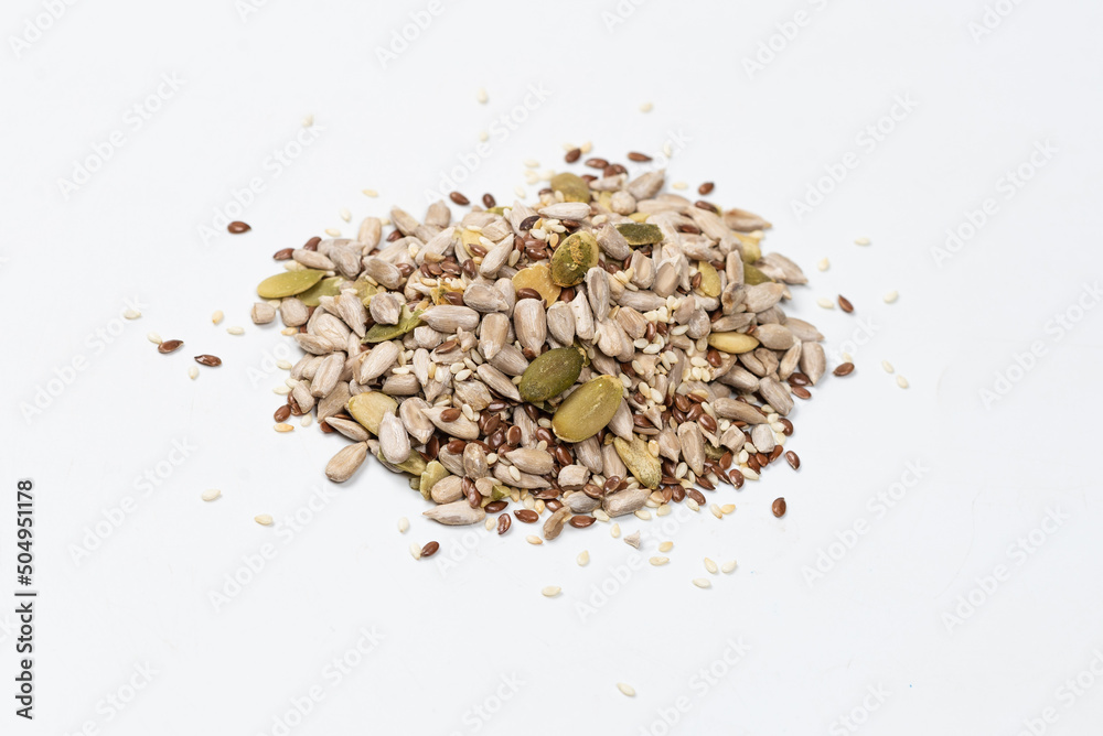 Mix of seeds for a salad. A pile of mixed seeds. Mix of seeds for a salad. A pile of mixed seeds.