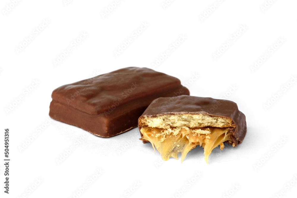 Chocolate dessert with cookie and caramel isolated on white background. Chocolate dessert with cookie and caramel isolated on white background.