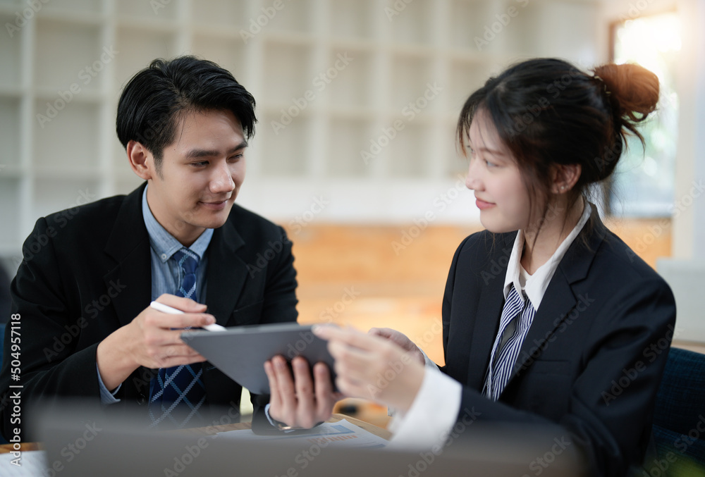 Two business startup team briefing plan project. creative startup business people group in office Two business startup team briefing plan project. creative startup business people group in office