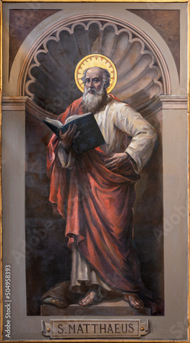 BARI, ITALY - MARCH 3, 2022: The fresco of St. Matthew the evangelist in the church Chiesa San Ferdinando by Nicola Colonna (1862 -1948). photo