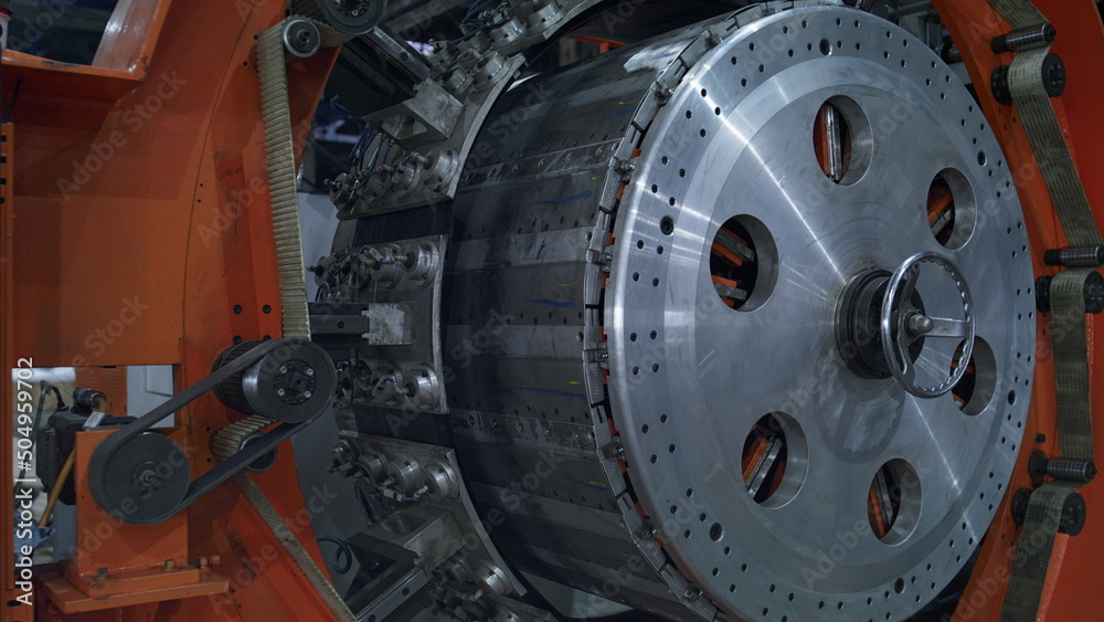 Fototapeta premium Robotic tire round machine working process at automated technological plant