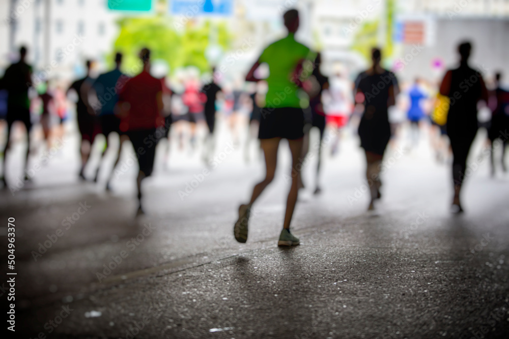 marathon runners in the city