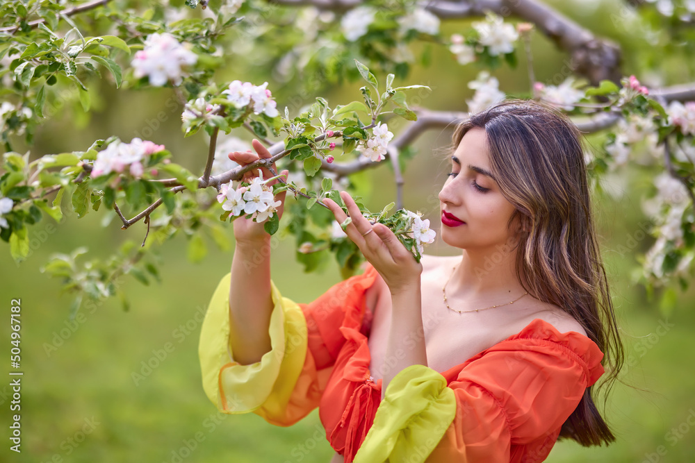 portrait of a woman in a dress in nature on a beautiful spring day portrait of a woman in a dress in nature on a beautiful spring day
