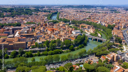 Photography Aerial view of Trastevere district and Tiber Island, the only river island in the part of the Tiber which runs through Rome, Italy