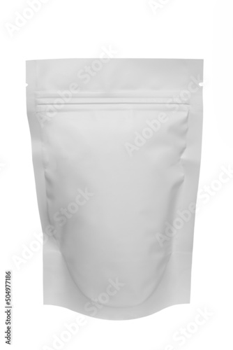 Blank foil plastic paper coffee bag in white color. Place for your text and logo. Copy space. White background. Isolated. Tea packaging. Clipping path. Mock up.