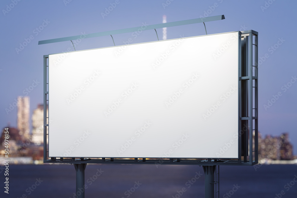 Blank white horizontal billboard on city buildings background at night, perspective view. Mockup, advertising concept Blank white horizontal billboard on city buildings background at night, perspective view. Mockup, advertising concept