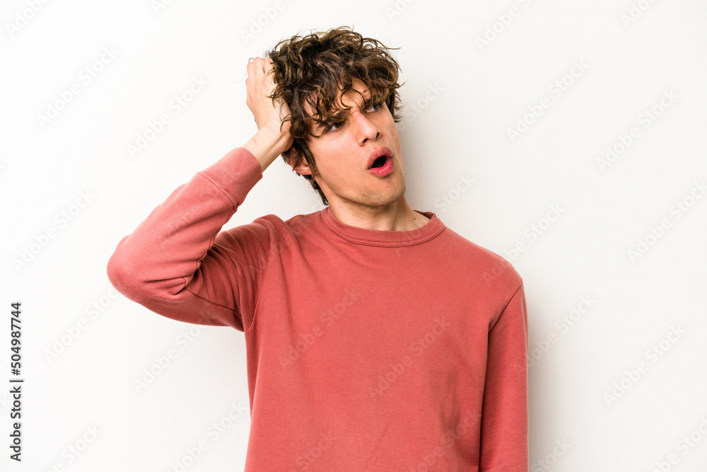 Young caucasian man isolated on white background being shocked, she has remembered important meeting. Young caucasian man isolated on white background being shocked, she has remembered important meeting.