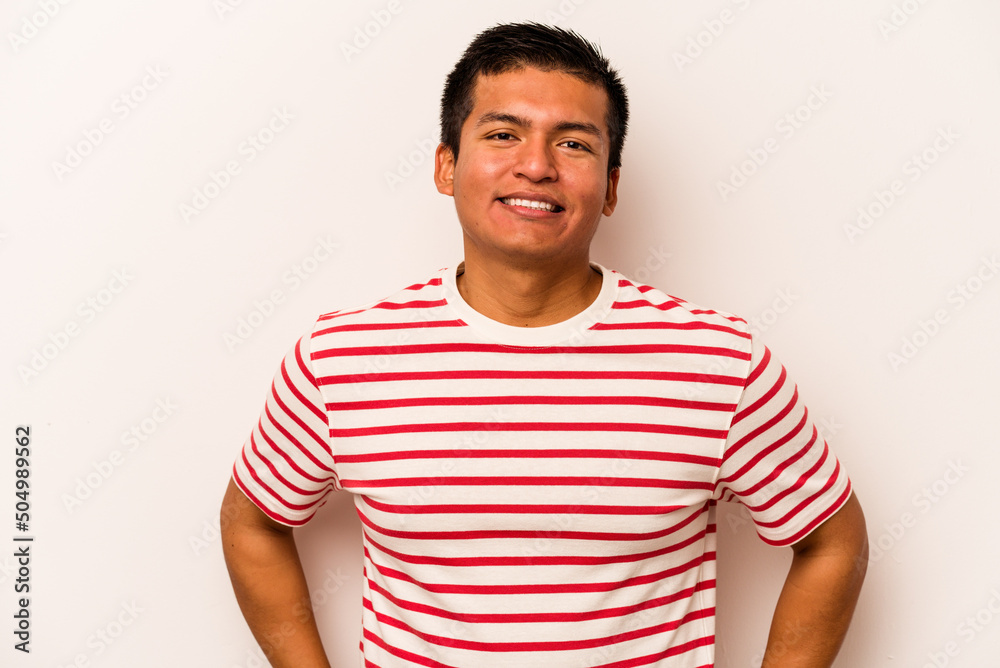 Obraz premium Young hispanic man isolated on white background happy, smiling and cheerful.