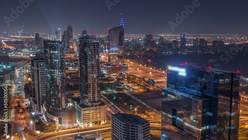 Aerial view of media city and al barsha heights district area all night timelapse from Dubai marina.