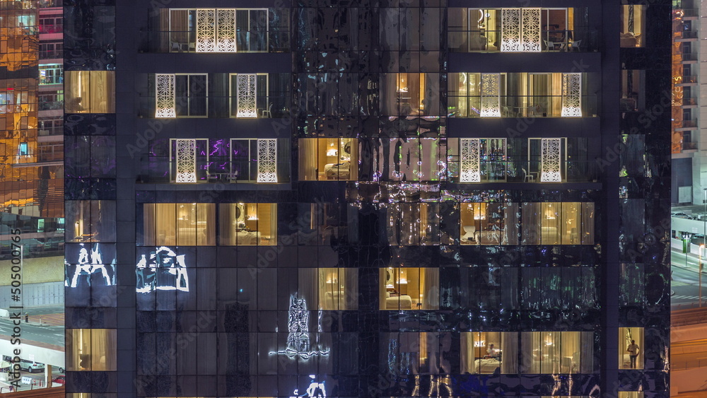 Windows lights in modern towers and residential buildings timelapse at night Windows lights in modern towers and residential buildings timelapse at night