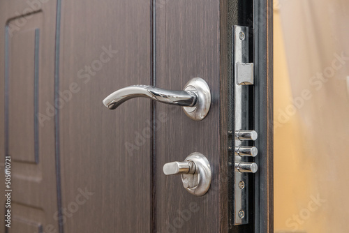 Entrance doors with a lock. Armored.	