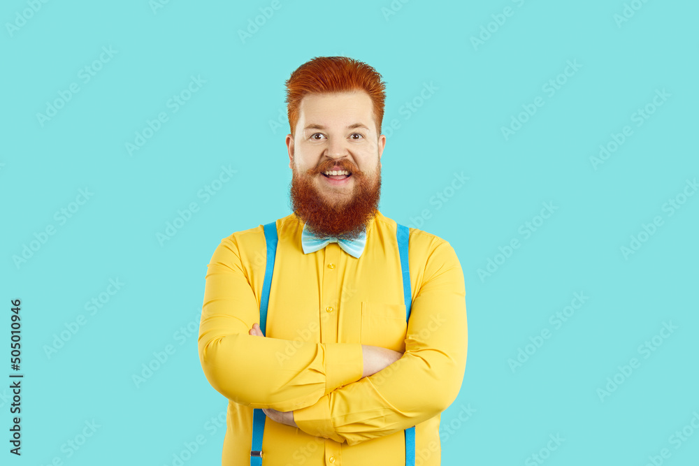 Happy plus size male fashion model in trendy outfit. Funny smiling joyful fat  man with ginger