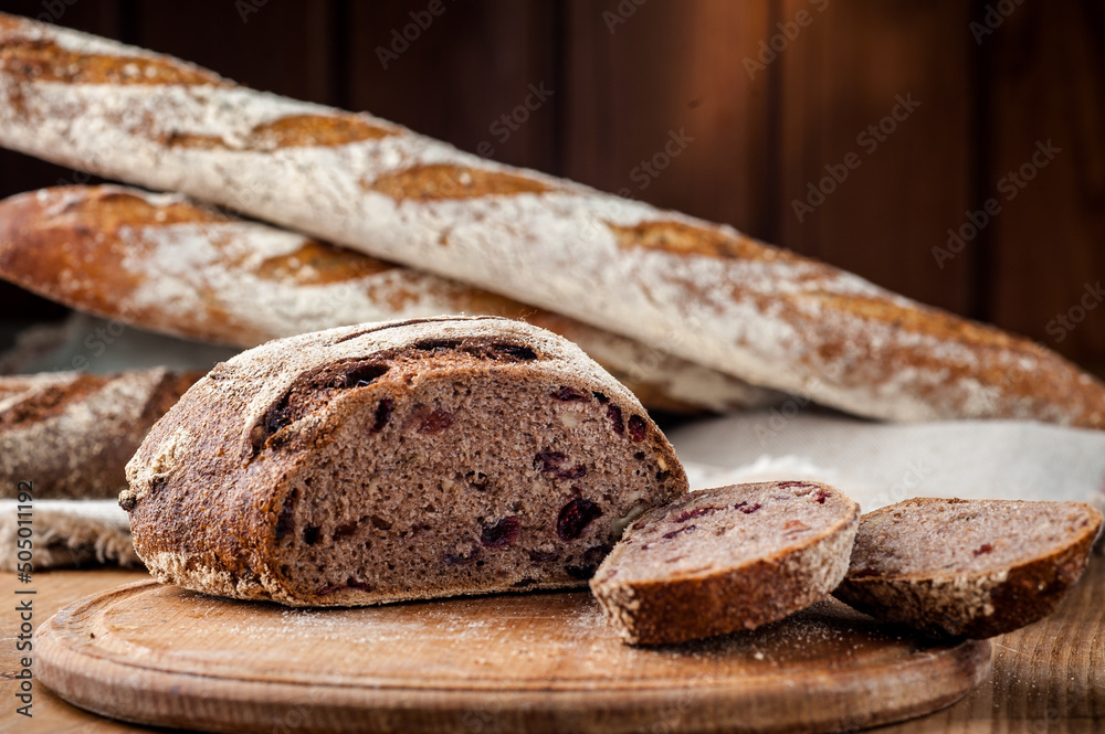 Bread. Baked bread. Craft bakery. Sliced bread on a wooden background. Food blog, food, pastries, flour, hot, fragrant, morning, fresh bread Bread. Baked bread. Craft bakery. Sliced bread on a wooden background. Food blog, food, pastries, flour, hot, fragrant, morning, fresh bread