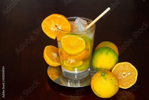 Typical Brazilian caipirinha drink with lemon and sugar cane cachaça