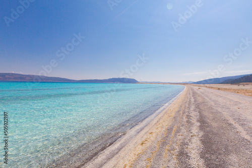 Salda Lake is a turquoise crater lake. Jezero Crater on Mars and Salda Lake in Burdur have similar geographical features and are known as Turkey's Maldives. photo