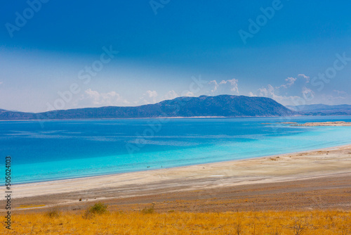 Salda Lake is a turquoise crater lake. Jezero Crater on Mars and Salda Lake in Burdur have similar geographical features and are known as Turkey's Maldives. photo