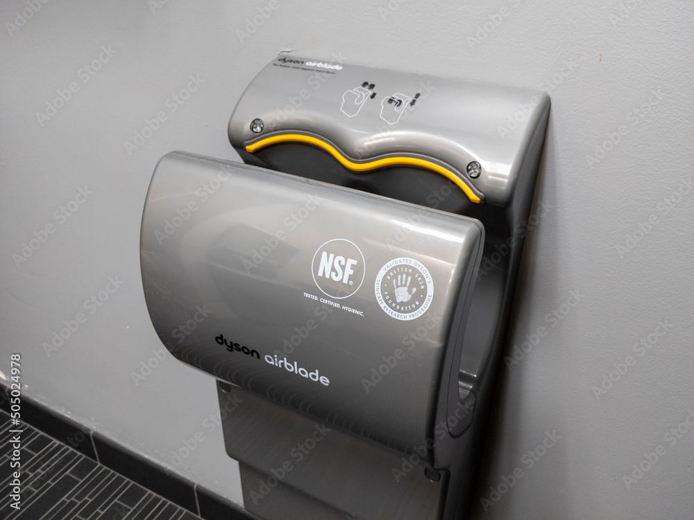 Seattle, WA USA - circa April 2022: Angled view a Dyson Airblade hand dryer inside a public restroom Stock Photo | Adobe