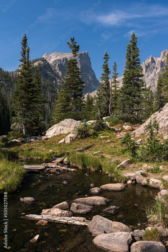 Obraz premium Rocky Mountain National Park with a trail that gives hikers a dramatic view of nature and high mountain peaks in Northern Colorado.